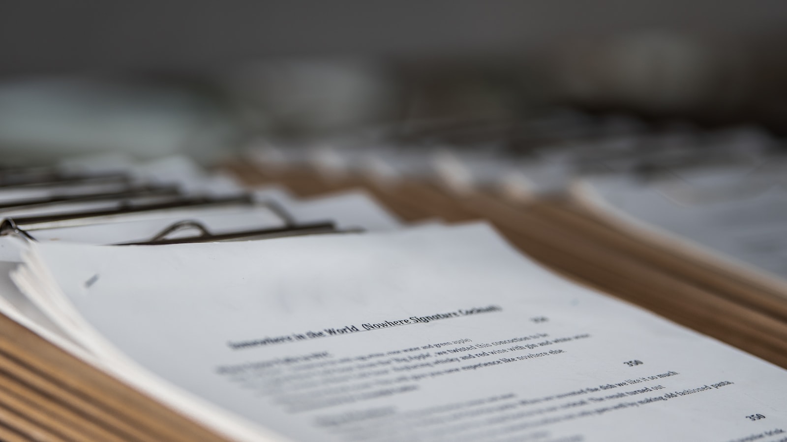 restaurant menus on clipboards close up